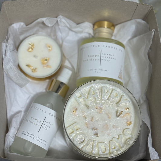 Gift set with candles and bottles in a box
